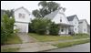 CTY-onyx.jpg A recently built house on Avondale Avenue is vacant and boarded up, in contrast to nearby older structures, which are occupied.