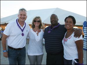 Barefoot-Beach-Brian-Renee-Mruzek-Romie-Shawn-Brown.jpg From left, Brian and Renee Mruzek with Romie and Shawn Brown.