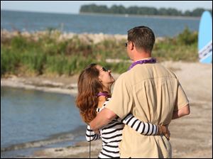 Barefoot-Beach-Jennifer-Kurt-Pollex.jpg Jennifer and Kurt Pollex of Sylvania enjoy each other's company at Barefoot at the Beach at Maumee Bay State Park in Oregon, Ohio.