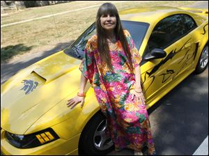 Collect-Call-Horses-Lynn-Burns-Ford-Mustang.jpg Lynn Burns takers her love of horses on the road with her 2004 40th Anniversary Mustang.