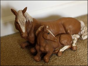 Collect-Call-Horses-Lynn-Burns-gift.jpg This figurine of mare and colt was a gift from a former student.