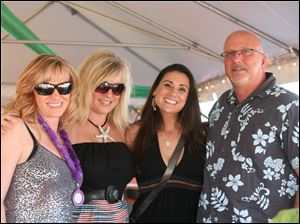 Barefoot-Beach-Christine-Kilman-Kim-Baumgartner-Celeste-Meyer-Jeff-Ruehle.jpg From left, Christine Kilman, Kim Baumgartner, Celeste Meyer, and Jeff Ruehle.