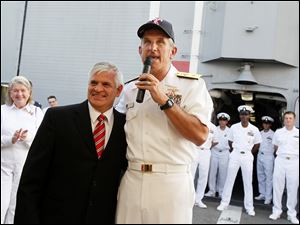 Navy-Week-De-Wert-Greg-Nosal-Tom-Jaksetic.jpg Rear Admiral Greg Nosal, commander of the U.S. Navy Carrier Strike Group 2, dons a Toledo Mud Hens hat while recognizing Toledo Fire and Rescue Department Deputy Chief Tom Jaksetic.