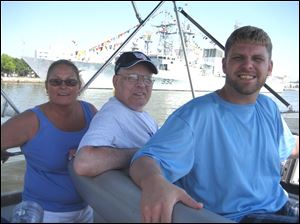 Navy-Week-Laura-Sudyvin-Mike-Cully-JR-Cousino.jpg Laura Studyvin, from left, Mike Cully, and JR Cousino on the harbor View Yacht Club's annual Maumee River cruise for developmentally disabled adults.