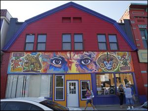 Broadway-murals-Picaso-Eyes.jpg Mario Torero has painted his trademark 'Picaso's Eyes' in Lima, Peru, and San Diego, as well as above the door of Joe Martinez's studio on Broadway.
