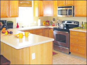 Brookridge-kitchen.jpg This well-appointed kitchen has an efficient layout that makes meal prep a pleasure.