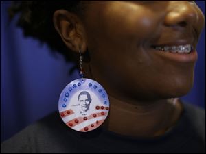 Democratic-Convention-Schwanna-Black.jpg Volunteer Schwanna Black of Charlotte, N.C., displays her earrings at the Democratic National Convention.