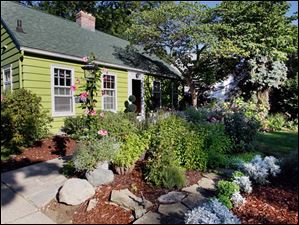 FEA-wiarjanice01p-getaway-1.jpg The beautiful cottage home of Janice Trudeau has become a garden getaway for its owner.