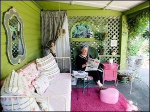 FEA-wiarjanice01p-outdoor-livingroom.jpg Janice Trudeau starts her day off every morning reading the paper and enjoying her outdoor living room.