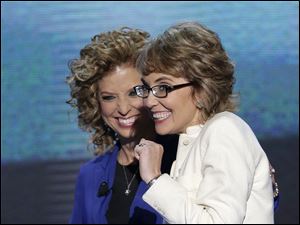 Democratic-Convention-Gabrielle-Giffords-Debbie-Wasserman.jpg Former Rep. Gabrielle Giffords, right, smiles with Democratic National Committee Chairwoman Rep. Debbie Wasserman Schultz of Florida after reciting the Pledge of Allegiance at the Democratic National Convention.