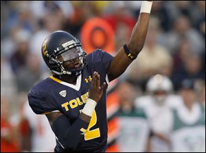 University-of-Toledo-quarterback-Terrance-Owens-fires-a-pass.jpg University of Toledo quarterback Terrance Owens fires a pass against Bowling Green at the Glass Bowl in Toledo.