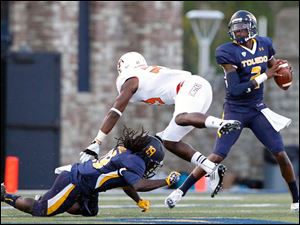 Owns-throws.jpg Toledo quarterback Terrance Owens looks to throw.
