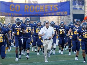 Toledo-football-coach-Matt-Campbell.jpg Toledo football coach Matt Campbell leads the Rockets onto the field.