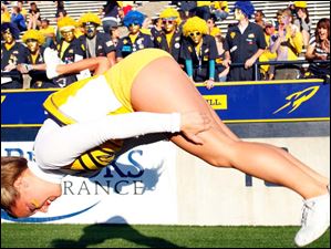 cheerleader-flip.jpg A Toledo cheerleader does a flip.