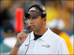 football-coach-Matt-Campbell.jpg Toledo football coach Matt Campbell directs the Rockets from the sideline.