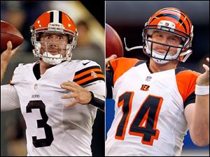 The Browns' Brandon Weeden, left, was named the team's starter despite being a rookie. There's a good chance today's game against the Bengals will be the first of many times that he faces Andy Dalton.