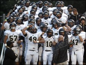 SPT-NLLfootball22p-5.jpg Perrysburg takes the field against Anthony Wayne.