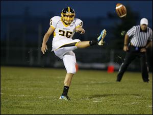 WEBsylv-northviewfball22p-5.jpg Nate Bartlett, of the Northview Wildcats, punts the ball.