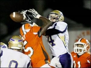 WEBsylv-southviewfball22p-12.jpg Maumee's senior wide receiver Sean McGovern breaks up a pass in the end zone intended for Southview's junior wide receiver J.J. Pickney.