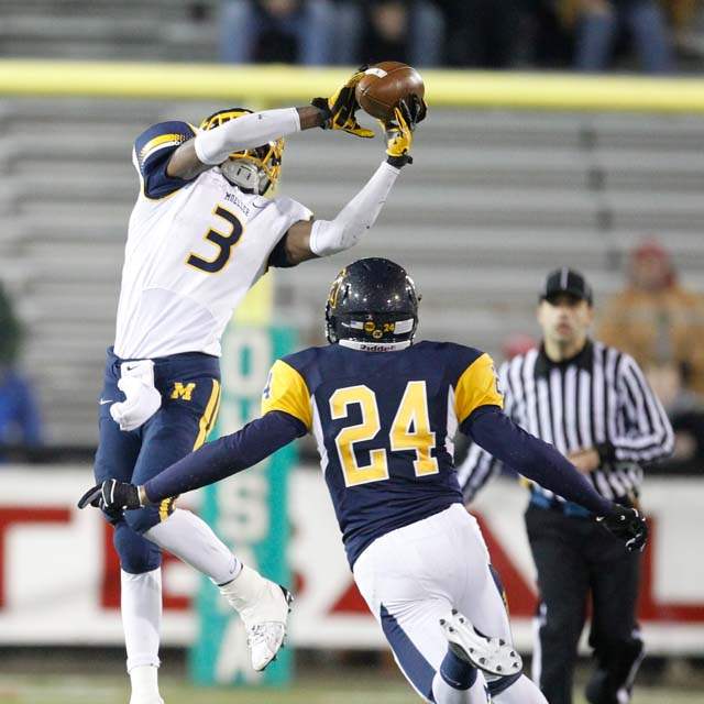 Whitmer-at-state-Leaping-grab