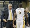Tod-Kowalczyk-Rian-Pearson.jpg Toledo head coach Tod Kowalczyk said that he has watched junior forward Rian Pearson mature over the last five years the two have been connected through basketball.
