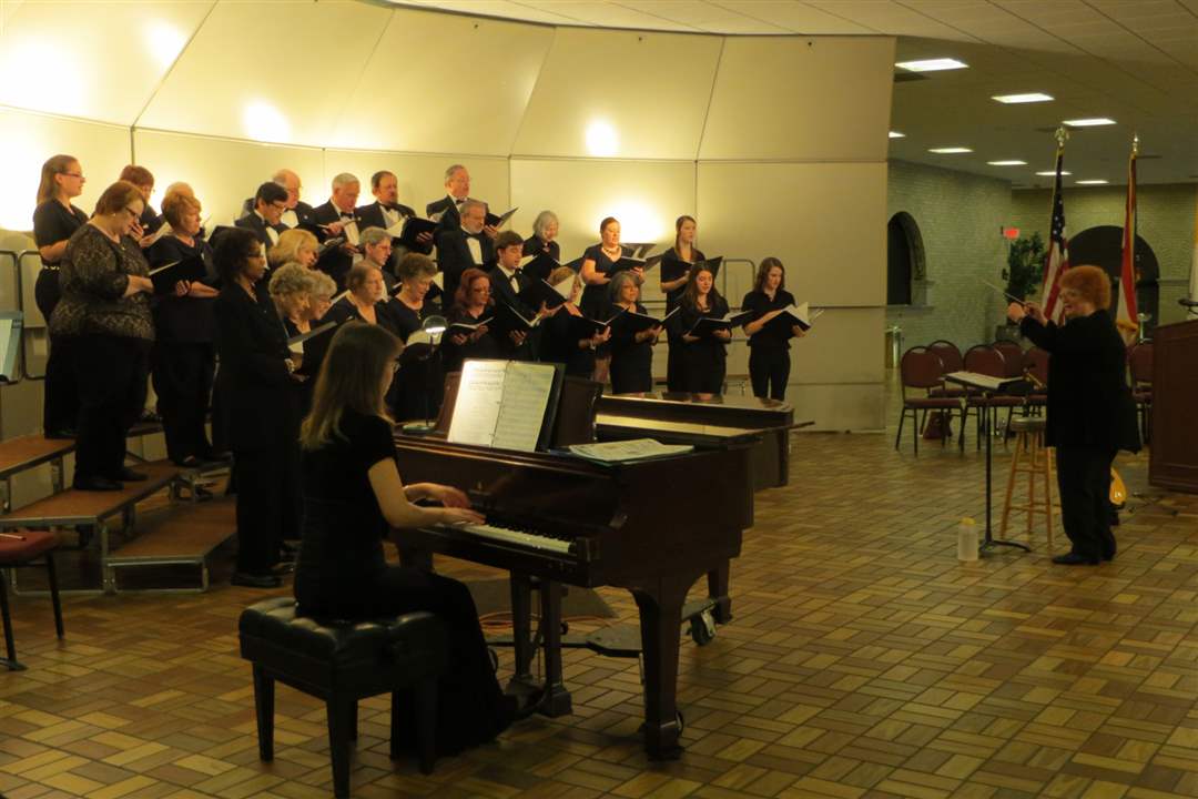 Lourdes-u-choir-pianist-and-conductor