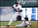  Cleveland's Asdrubal Cabrera scores after Detroit's Justin Verlander walked Jason Giambi with the bases loaded in the first inning. Verlander gave up three earned runs and walked five in five innings.