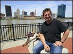  Rob Storm, a Toledo singer/songwriter who wrote a song about Toledo called 