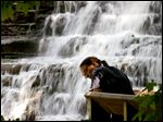  Alison Yasick views the scenery of  Brandywine Falls in Sagamore Hills.