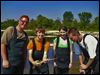  Alex Kocher (Bowsher) holds a longnose gar that he and fellow Wildlife Management students Will Gilbert III (Waite), left, Leigha Kelley (Waite), and Tres' Black (Start) netted during field work on the Maumee River.