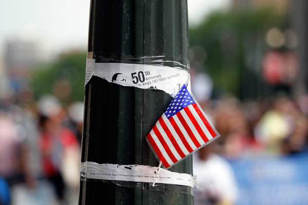 A-US-flag-on-a-pole-with-an-announ