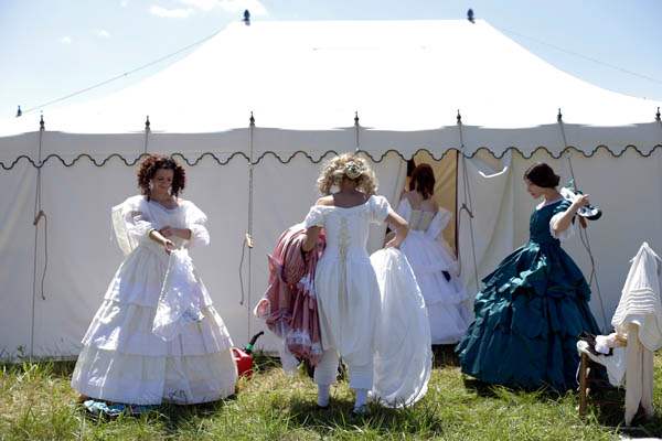 Women-take-off-Civil-War-era-ball-gowns-rev