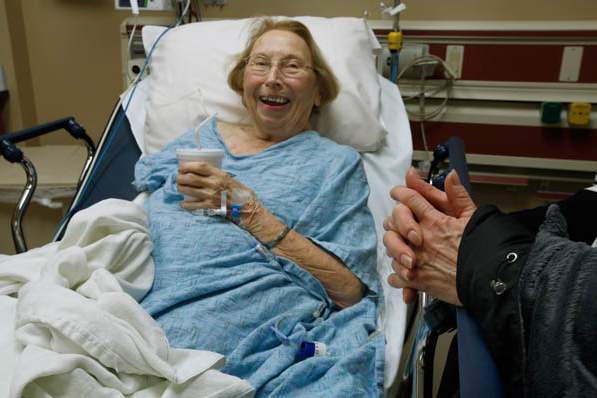 Patient-Ruth-Conway-shares-a-laugh-with-a-family-visito