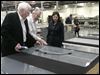 02n1wk-4.jpg Michael Cicak, left, of Willard & Kelsey and manager Vince Poleo guide Labor Secretary Hilda Solis, one of several key Democrats to visit the firm, in 2011.