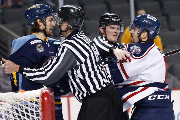 Toledo-s-Tyler-Elbrecht-and-South-Carolina-s-Dale-Mitchell-are-separated-by-referees-1