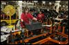 11n3jeep.jpg Ruth Jenkins of Erie, Mich., left, and Tonya Colbert of Toledo work at the Toledo Assembly complex, where employees have been putting in 60-hour weeks.