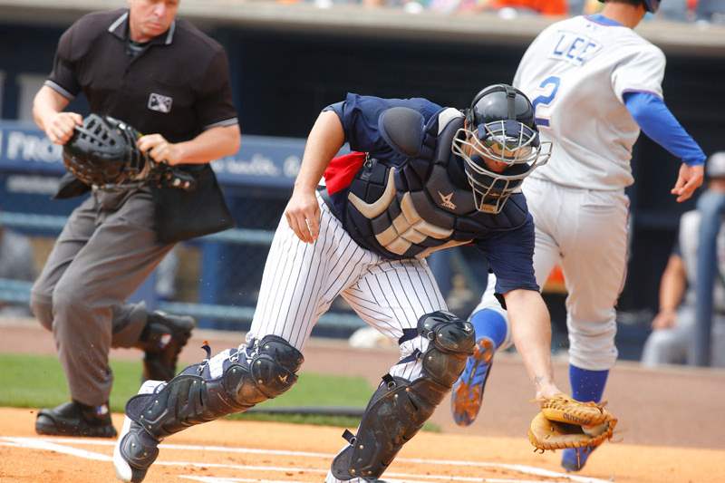 SPT-Hens29pToledo-Mud-Hens-catcher-Luis-Exposito-fie