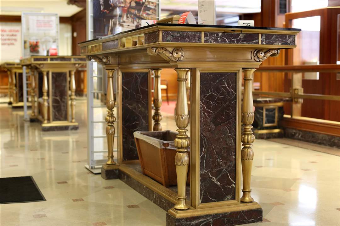 BIZ-bank28-brass-and-marble-table